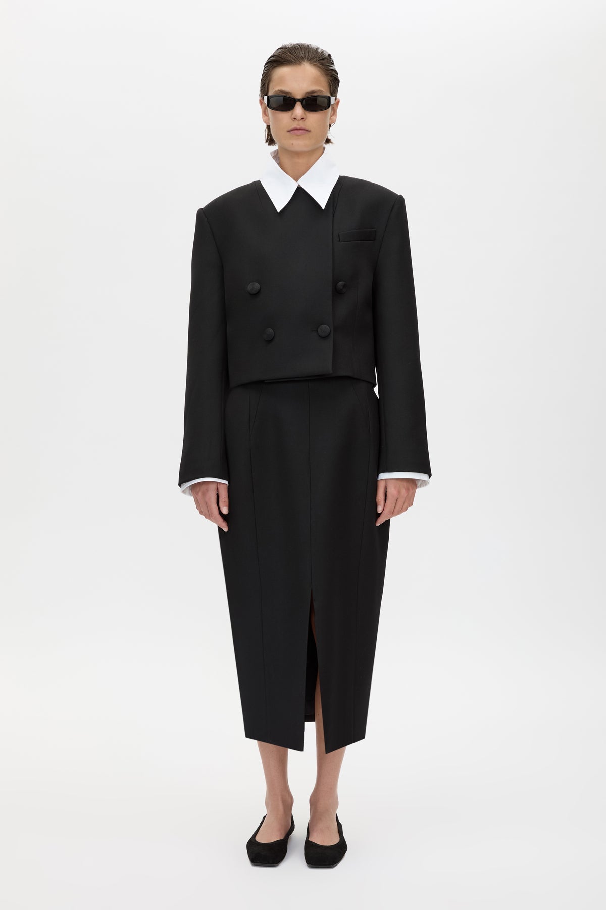 Front styled view CAMILLA AND MARC Caius Relaxed Cropped Blazer in Black with collarless neckline in Australian wool.