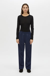 Front view CAMILLA AND MARC Barre Long Sleeve Top in Black with slim silhouette.