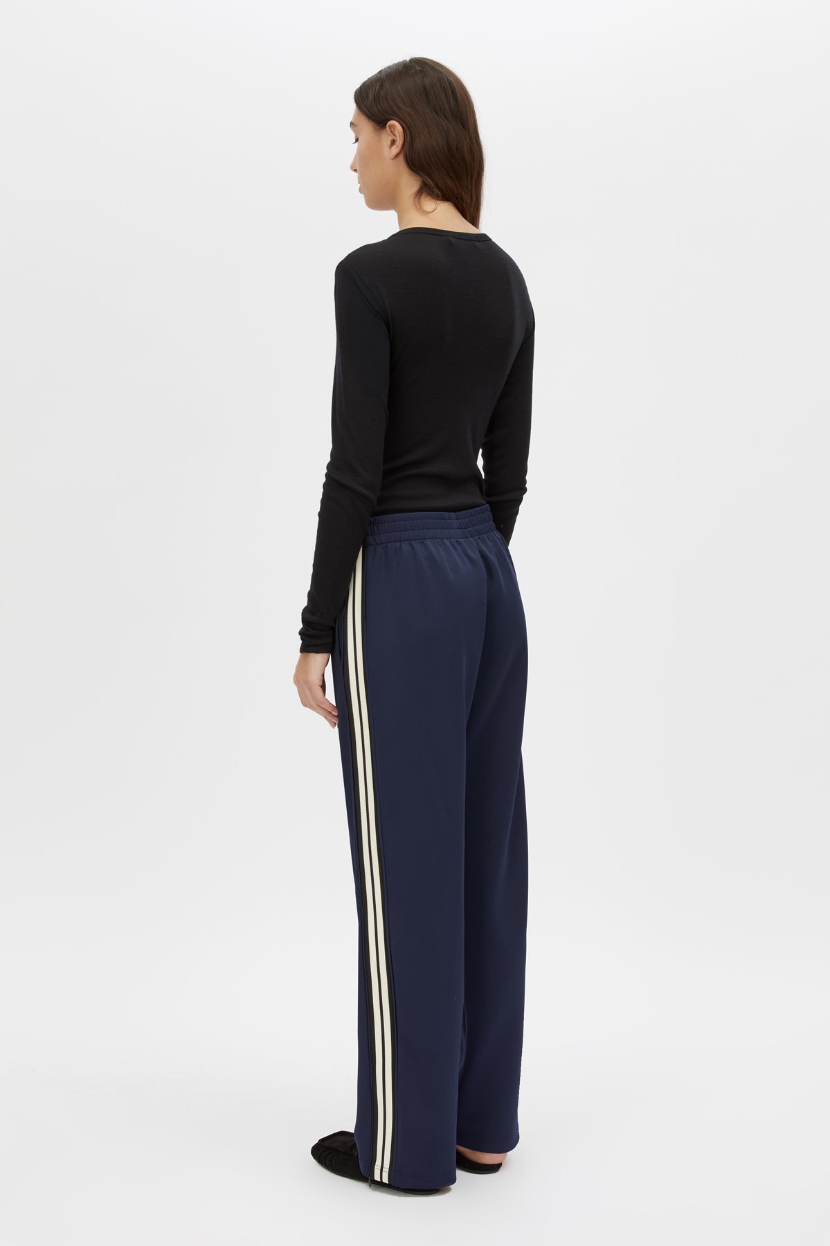Back view CAMILLA AND MARC Barre Long Sleeve Top in Black with slim silhouette.