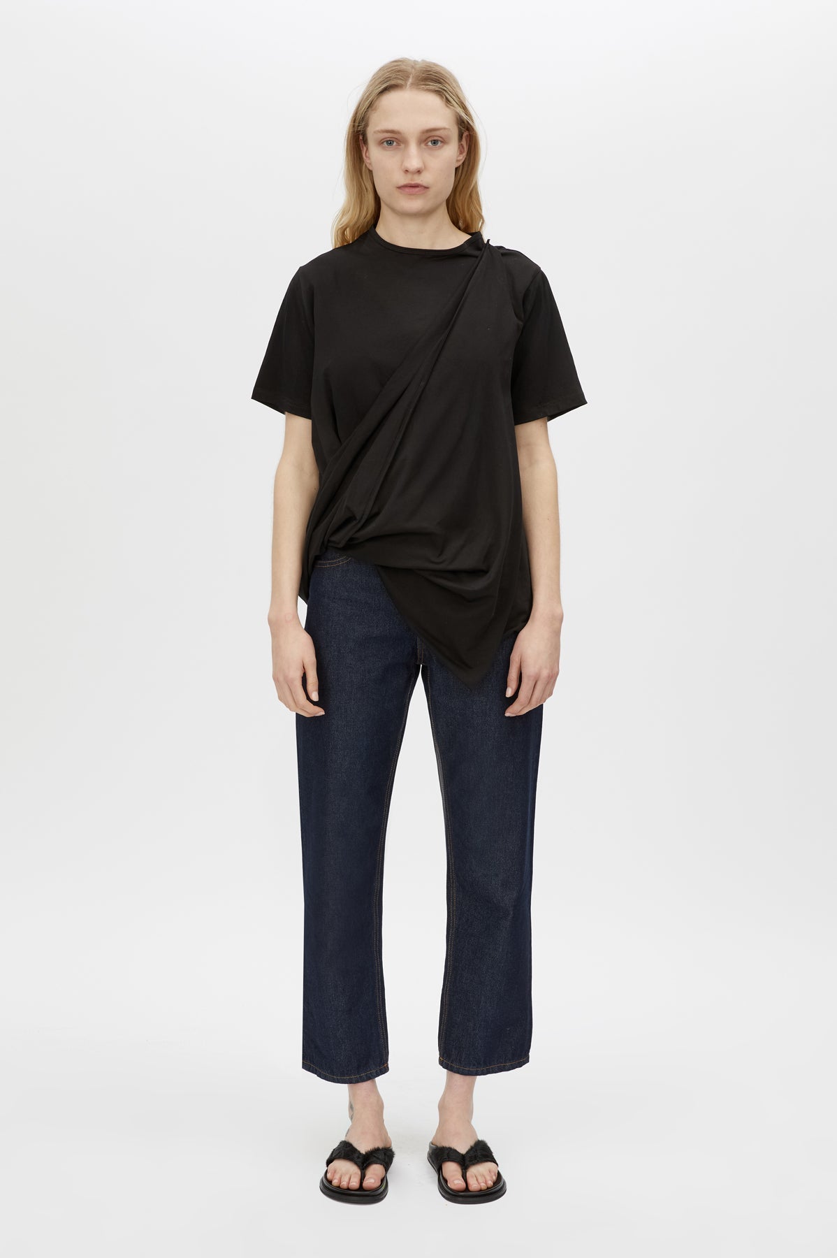 Styled view CAMILLA AND MARC Clarity draped oversized asymmetric tee in black with raw hemline and internal french seams.