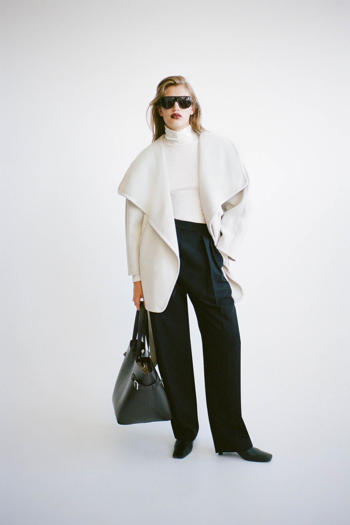 Front view CAMILLA AND MARC Audrey Wrap Jacket in Oat styled with the Tala Double Barrel Pant.
