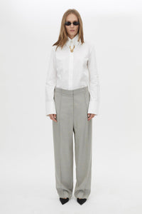 Front styled view CAMILLA AND MARC Aspira Pant in Dusty Blue with a wide‑leg tailored silhouette.