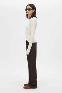 Side view CAMILLA AND MARC Barre Long Sleeve Top in Soft White with slim silhouette.