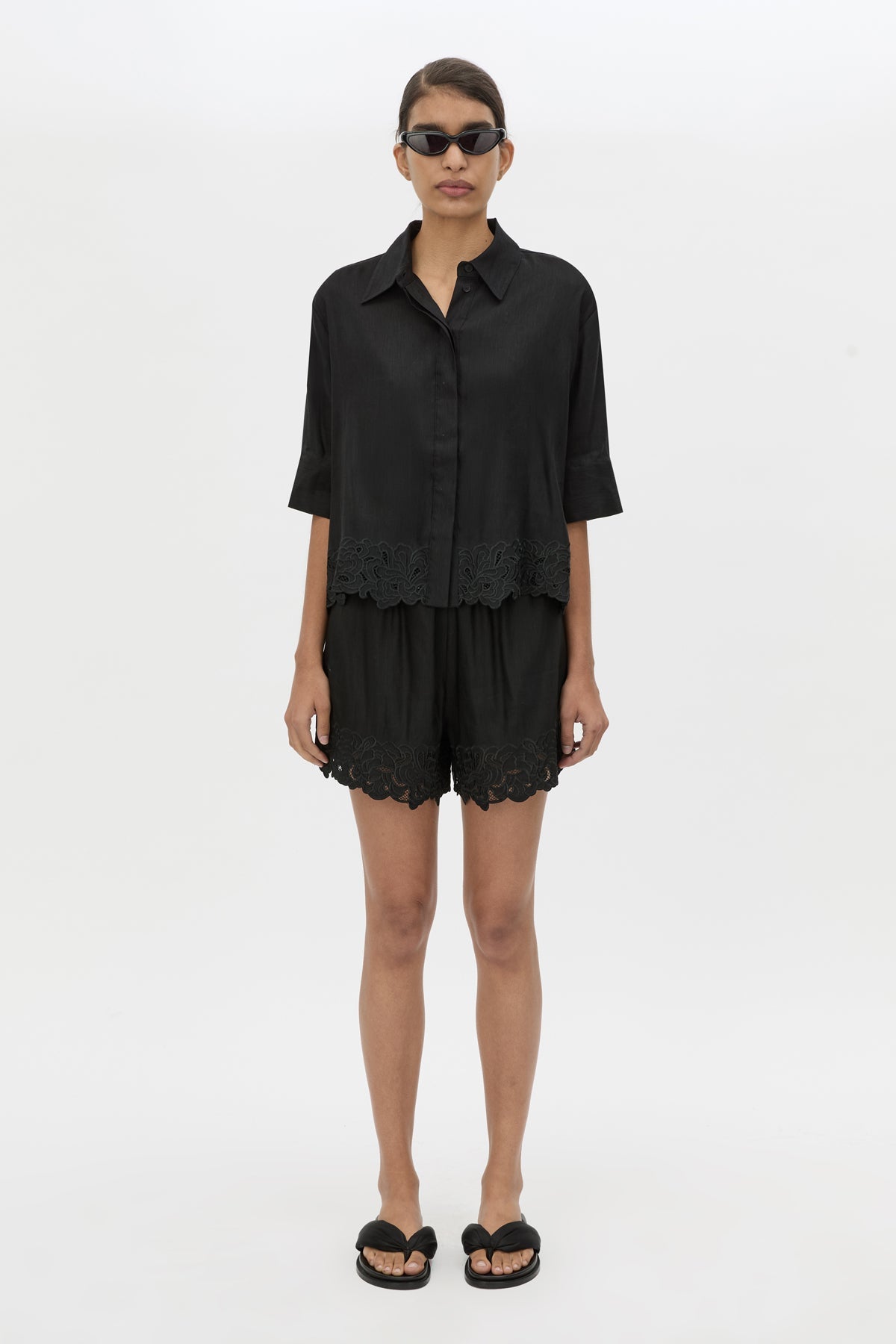 Front styled view CAMILLA AND MARC Chara Embroidered Cropped Shirt in Black with short sleeves.