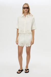Front view CAMILLA AND MARC Chara Embroidered Cropped Shirt in Cream with short sleeves, lace hem and slight A‑line fit.