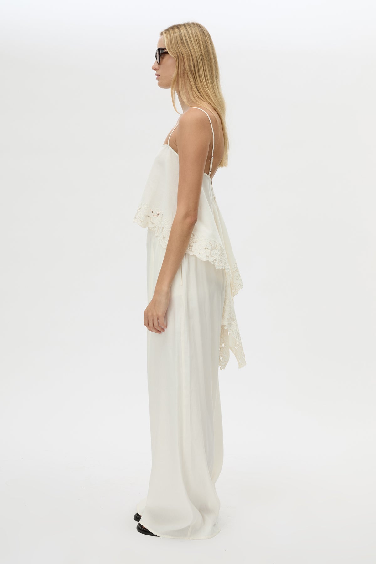Side view CAMILLA AND MARC Chara Relaxed Pant in Cream with elastic waist, and back welts.