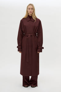 Front view CAMILLA AND MARC Dia Trench Coat in Burgundy styled closed.