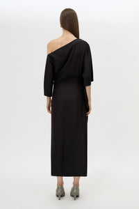 Back view CAMILLA AND MARC Elsen Off Shoulder Midi Dress in Black with asymmetric neckline.