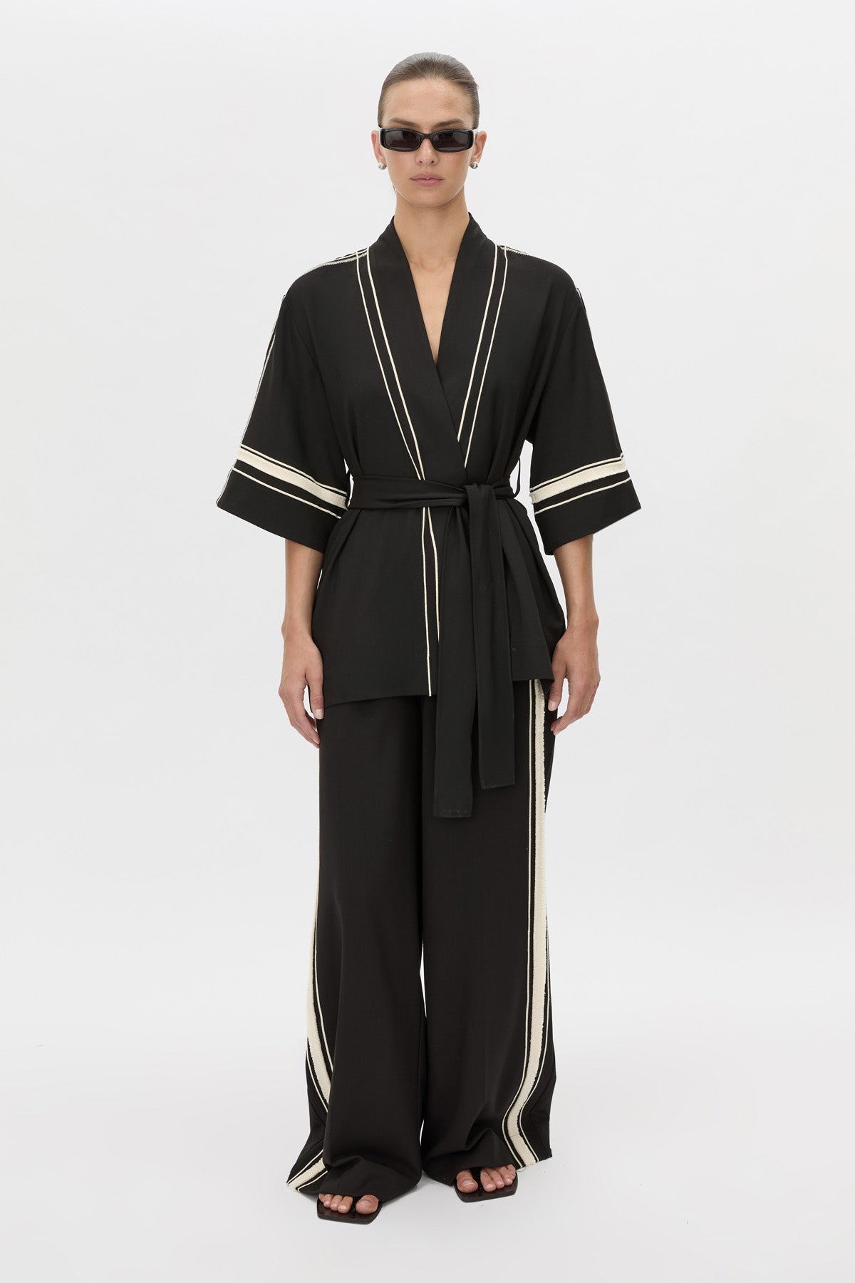 Front view CAMILLA AND MARC relaxed Enna Robe in black with embroidery detail.