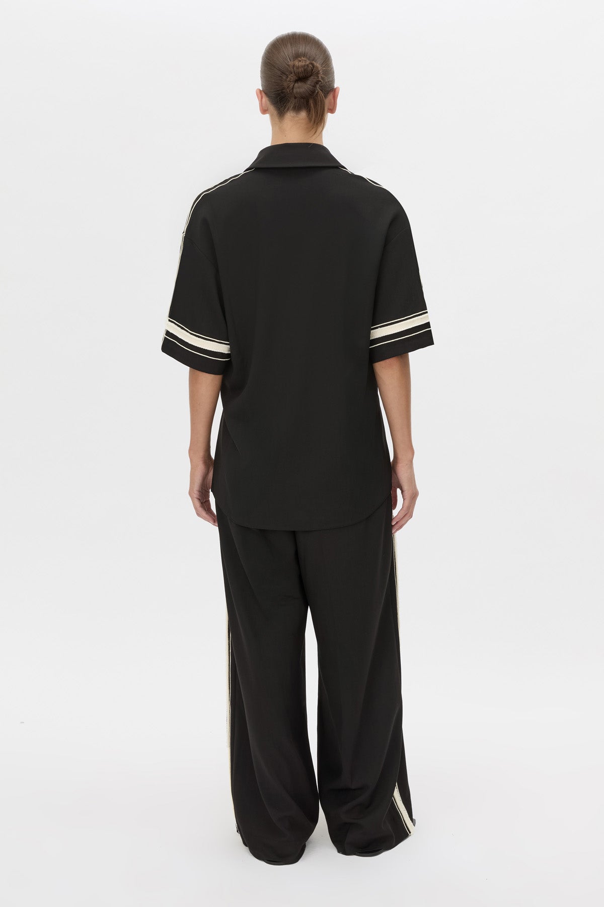 Back view CAMILLA AND MARC relaxed Enna Shirt in black with embroidery detail.