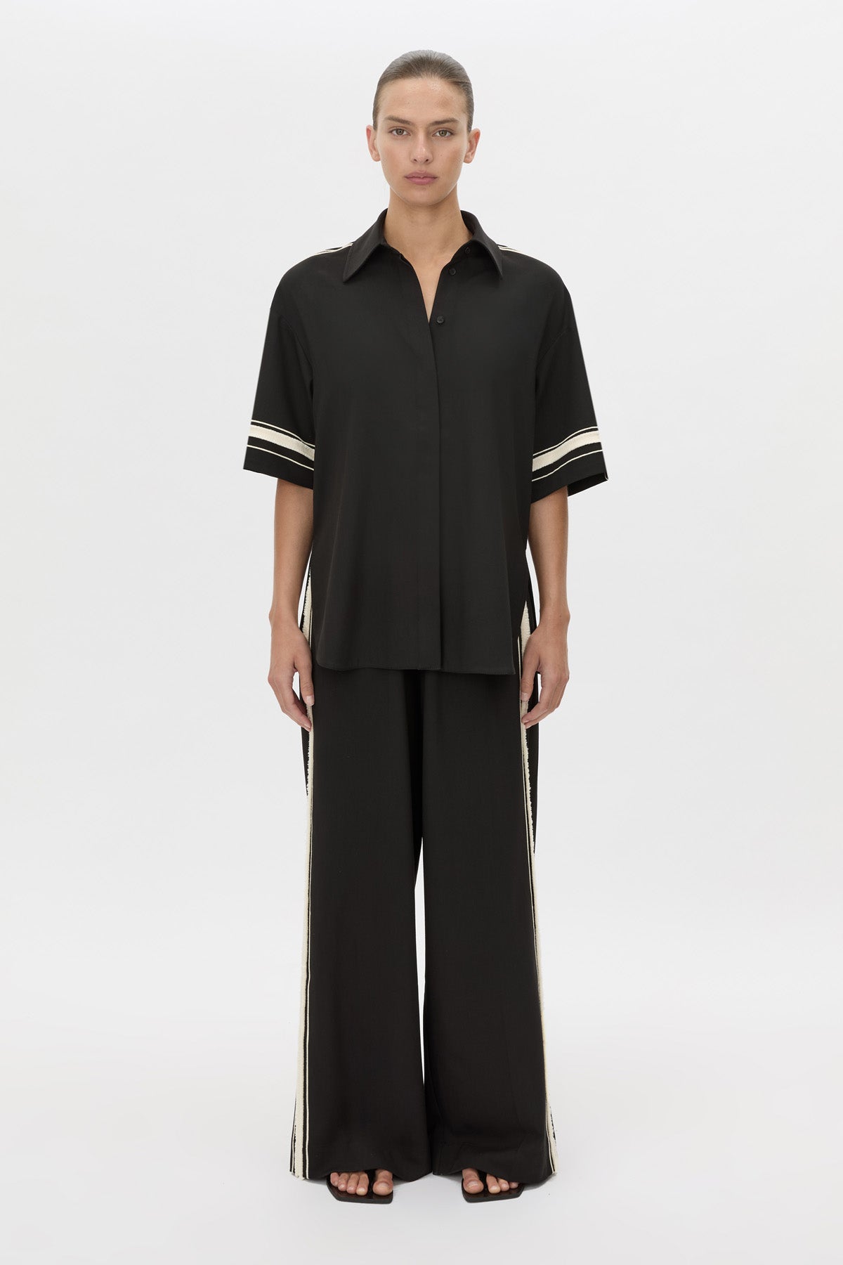 Front view CAMILLA AND MARC relaxed Enna Shirt in black with embroidery detail.
