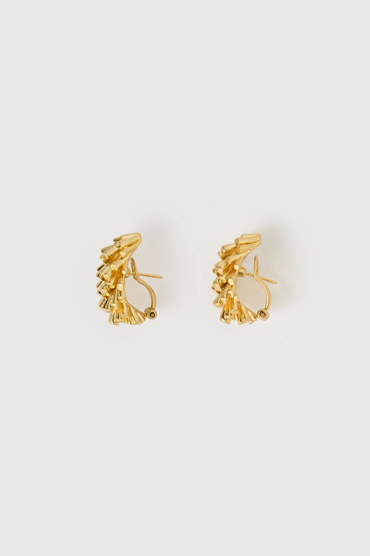 Side view CAMILLA AND MARC Friesian Earrings with worn look 18k gold plating. 