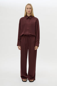 Front view CAMILLA AND MARC Ground Satin Pant in Black styled with the Ground Satin Long Sleeve Shirt.