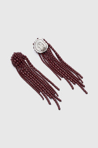 Ghost view CAMILLA AND MARC Irida Drop Earrings in burgundy with glossy beaded drop design.