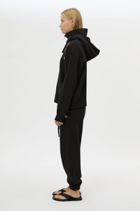 Side view CAMILLA AND MARC Lyra Embroidered Hoodie in Black and White with exposed quarter‑zip opening.