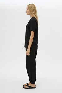 Side view CAMILLA AND MARC Lyra Logo Tee in Black with a 100% cotton fabrication.
