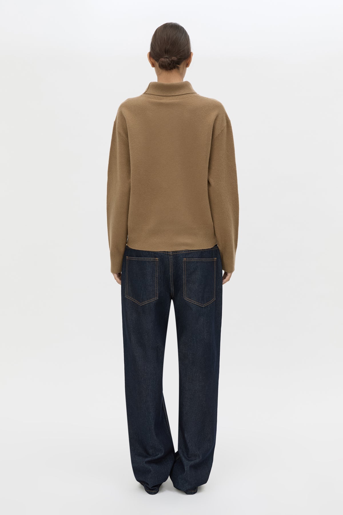 Back view CAMILLA AND MARC Margot Turtleneck Knit Sweater in Cinnamon with ribbed collar and hems.