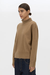 Cropped view CAMILLA AND MARC Margot Turtleneck Knit Sweater in Cinnamon with ribbed collar and hems.