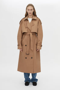 Front Model View CAMILLA AND MARC Nelle trench coat in toffee twill fabrication with an oversized fit.