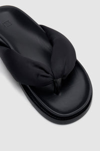 Close up view CAMILLA AND MARC Nina Slide Sandal in Black with padded satin straps.
