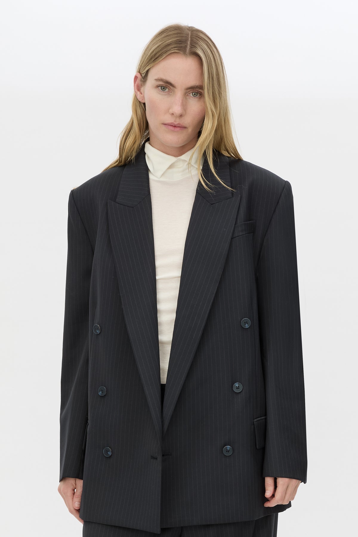 Cropped view CAMILLA AND MARC Orban Oversized Blazer in Navy pinstripe with double‑breasted button closure.
