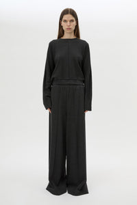 Front View CAMILLA AND MARC Pace Track Pant in charcoal grey with elasticated waist and wide-leg.