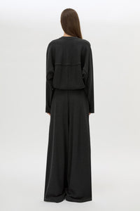 Back View CAMILLA AND MARC Pace Track Pant in charcoal grey with elasticated waist and wide-leg.
