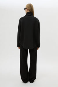 Back view CAMILLA AND MARC Salem Bonded Fleece Jacket in black with high collared neckline.