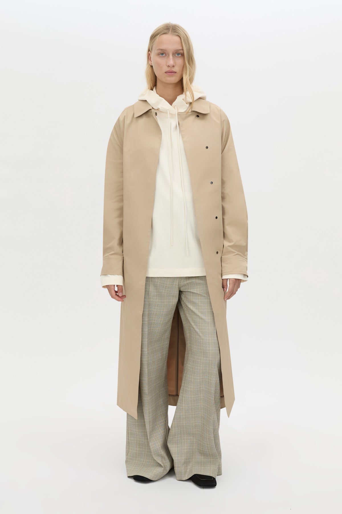 Front view CAMILLA AND MARC Studio Hoodie in White styled with the Mahdavi Trench.