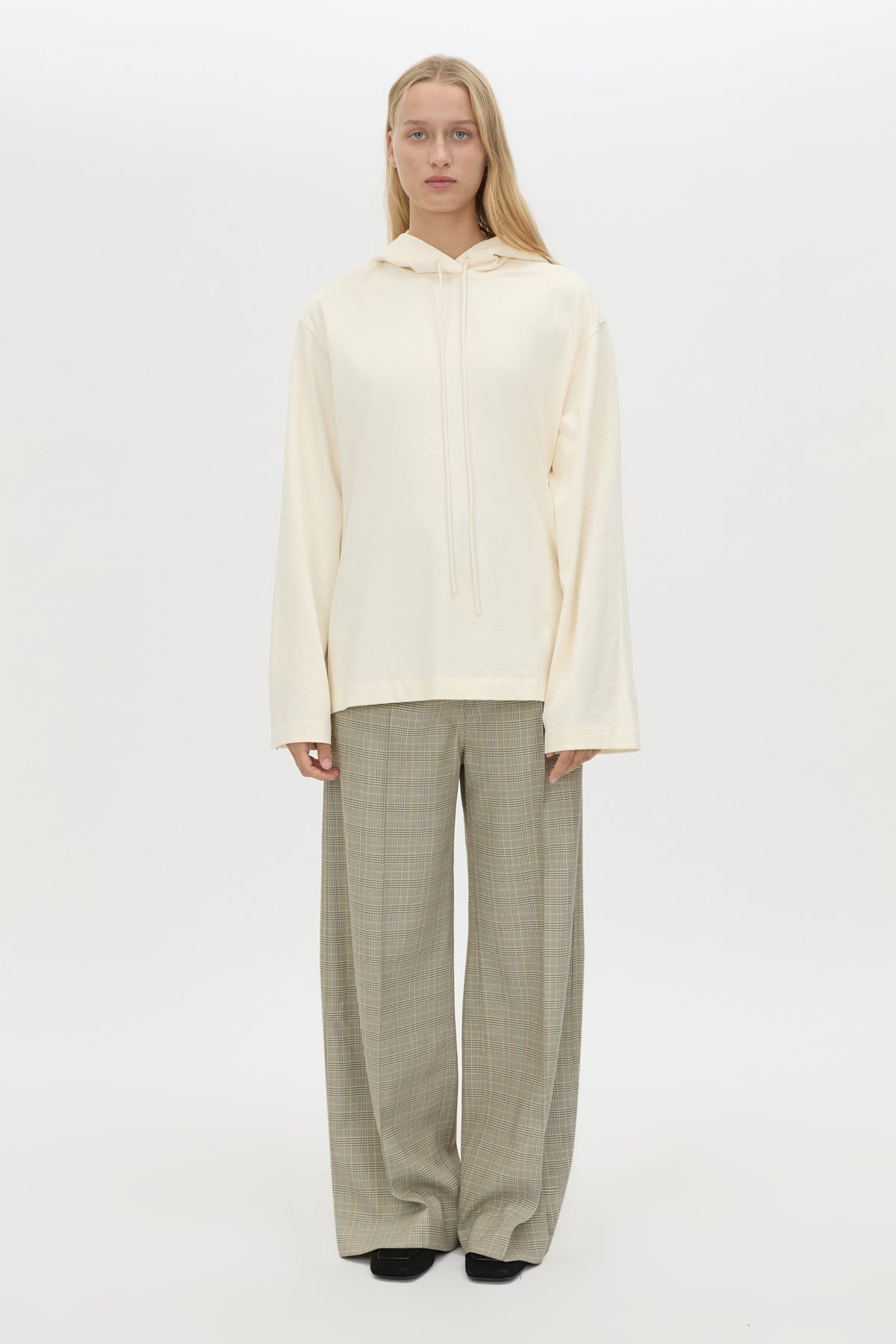 Front styled view CAMILLA AND MARC Studio Hoodie in White with relaxed long‑sleeve design and hooded silhouette.  