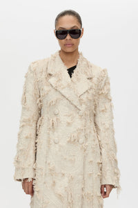Cropped view CAMILLA AND MARC Tundra Double Breasted Coat in Stone with exaggerated shoulders, fitted waist and jacquard floral texture.